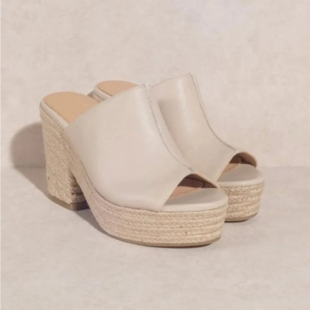 Slip On Wedge Mule in Beige. Size: 6.5. NWOT. Never been worn!